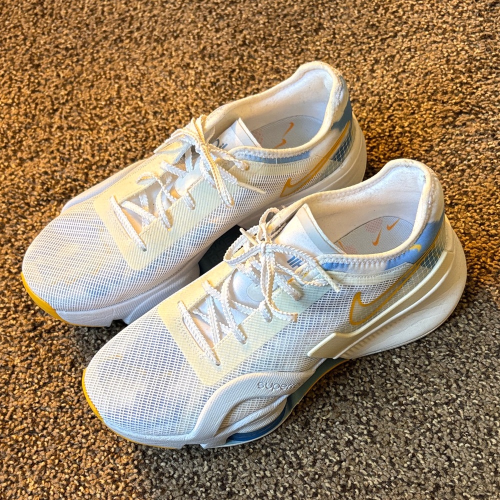 Nike White and Gold Athletic Shoes